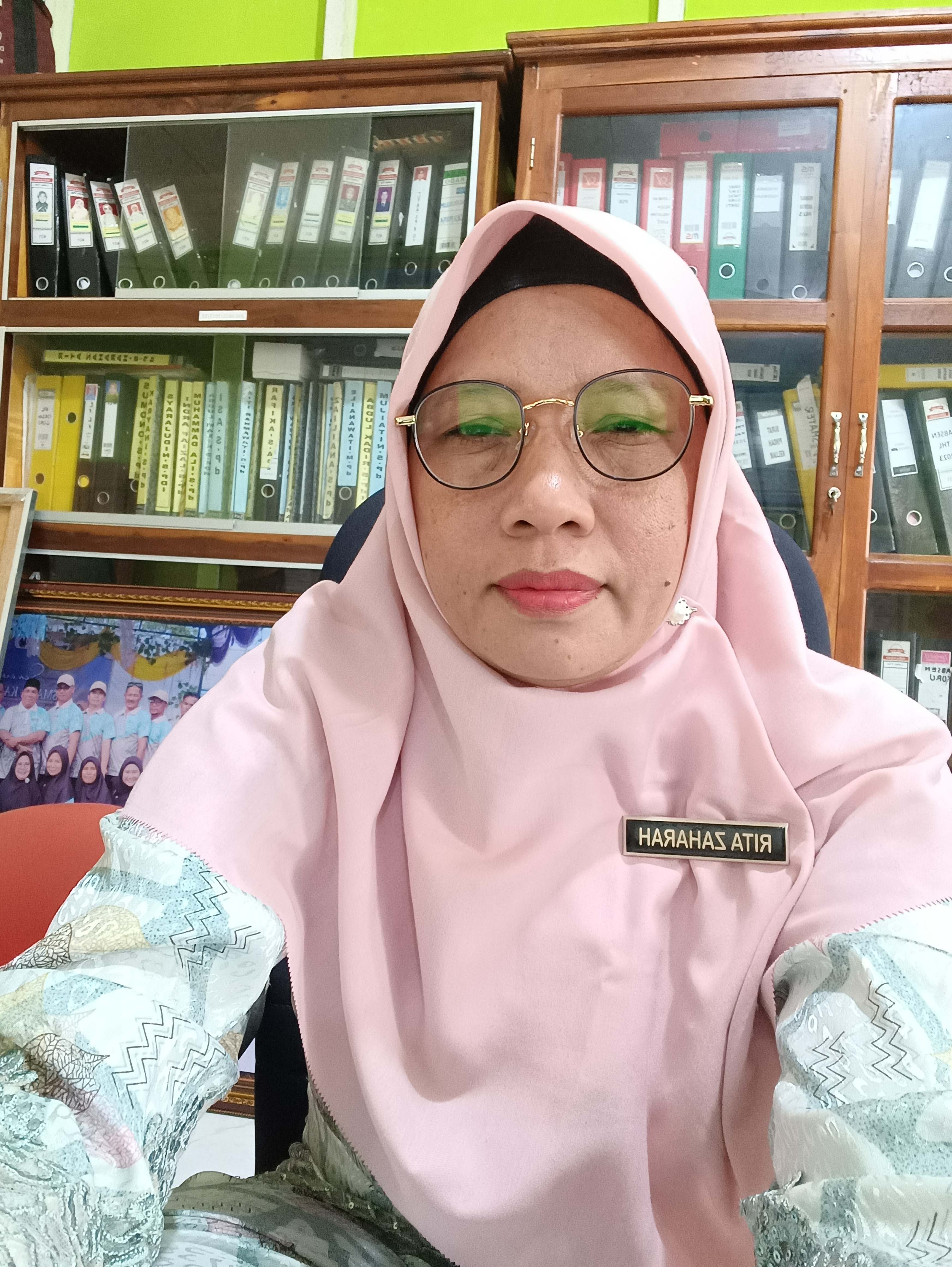 Rita Zaharah, S.Pd